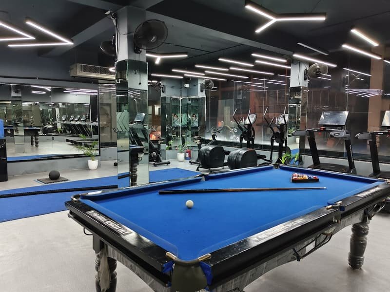 Pool table in the lounge next to the cardio machines